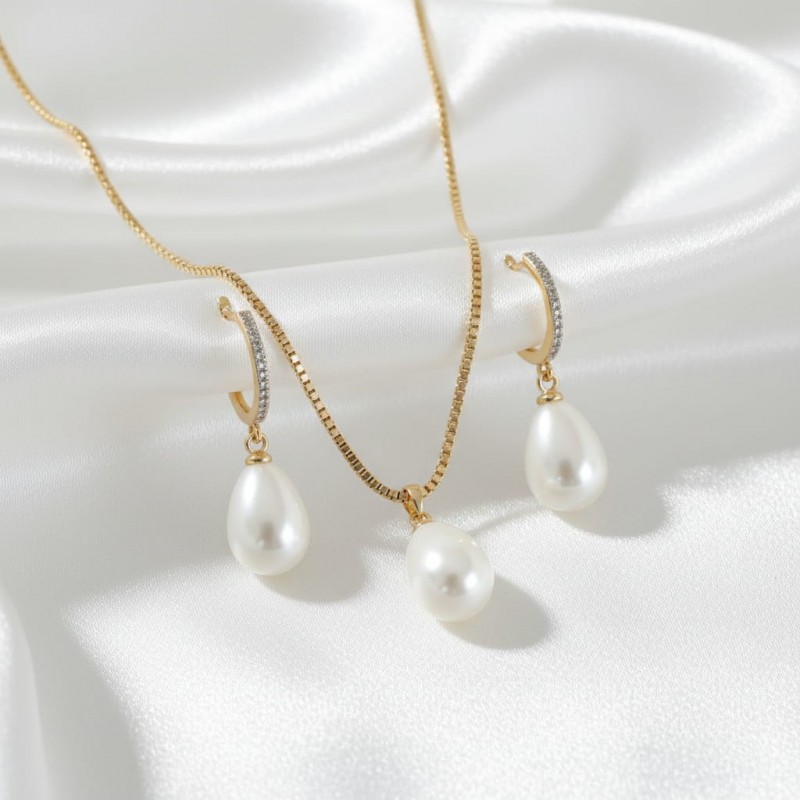 Lüks Damla İnci Kolye Küpe Seti - Zirkon Taşlı Kararmaz Çelik Altın Kaplama Hediye Seti Lüks Damla İnci Kolye Küpe Seti - Zirkon Taşlı Kararmaz Çelik Altın Kaplama Hediye Seti