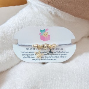 Altın Kaplama Charm Detaylı Gri İpli Ayarlanabilir Bileklik – Deniz Yıldızı ve Balina Kuyruğu Nazar Boncuğu Charm Altın Kaplama Charm Detaylı Gri İpli Ayarlanabilir Bileklik – Deniz Yıldızı ve Balina Kuyruğu Nazar Boncuğu Charm